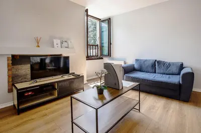 Coin salon dans l'établissement Chez Ismarita & Jérôme - Tout Dax à pied - Wifi