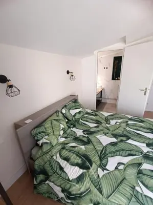 Un ou plusieurs lits dans un hébergement de l'établissement Maison à Vieux Boucau les Bains