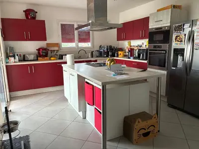 Cuisine ou kitchenette dans l'établissement Maison de l amour