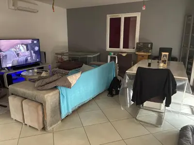 Télévision ou salle de divertissement dans l'établissement Maison de l amour