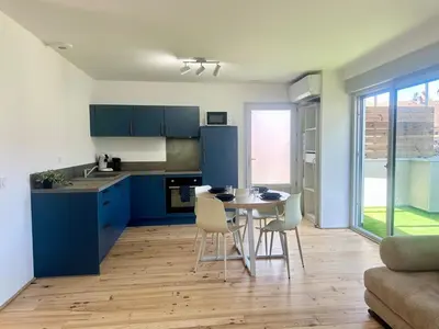 Cuisine ou kitchenette dans l'établissement Le Patio - Parking privé - Terrasse