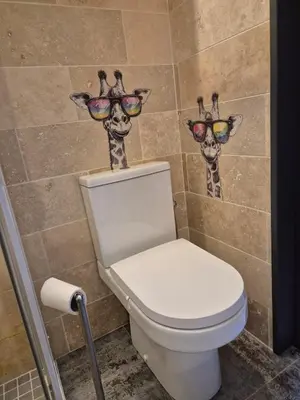Salle de bains dans l'établissement La Piôle du Lac