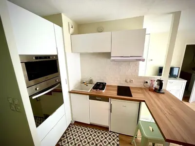Cuisine ou kitchenette dans l'établissement Joli studio, bassin d'Arcachon, parking privé, balcon