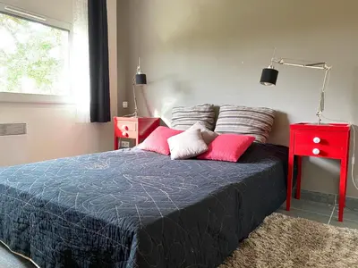 Un ou plusieurs lits dans un hébergement de l'établissement Les Chênes Lièges grande villa avec piscine