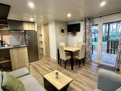 Cuisine ou kitchenette dans l'établissement Les Dunes d'EZC - Mobil-home familial 6-8 personnes, 3 chambres confort premium dans un camping 4 étoiles