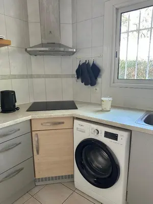 Cuisine ou kitchenette dans l'établissement La petite vague du pyla