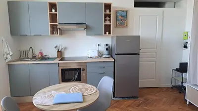 Cuisine ou kitchenette dans l'établissement Chez Nous
