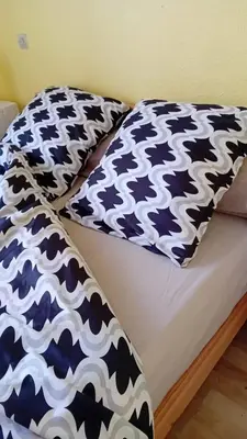 Un ou plusieurs lits dans un hébergement de l'établissement Appartement moderne à Moliets-et-Maa de 24 m²