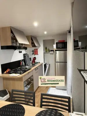 Cuisine ou kitchenette dans l'établissement L'Escapade Seignossaise