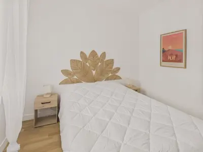 Un ou plusieurs lits dans un hébergement de l'établissement Plein centre - Appart pour 6 avec balcon