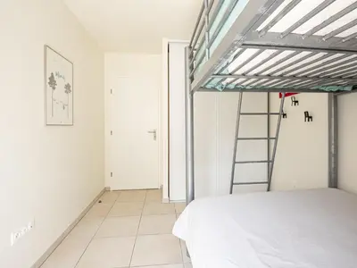 Un ou plusieurs lits dans un hébergement de l'établissement L'appartement près de la source