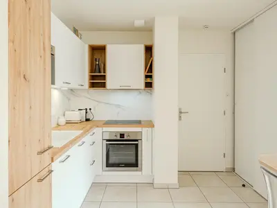 Cuisine ou kitchenette dans l'établissement L'appartement près de la source