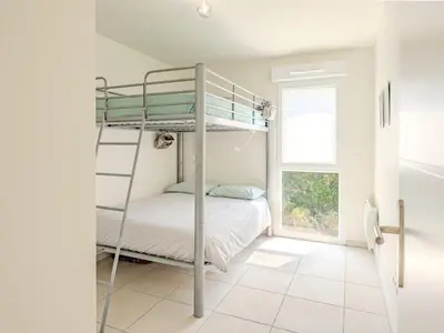 Un ou plusieurs lits dans un hébergement de l'établissement L'appartement près de la source