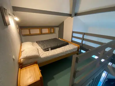 Un ou plusieurs lits dans un hébergement de l'établissement Appartement 32m² avec Terrasse à Soustons - API-1-52-550