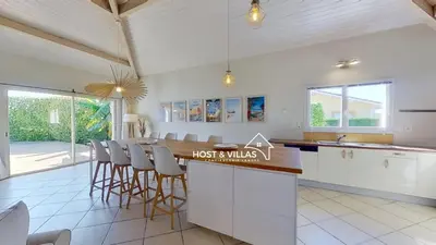 Cuisine ou kitchenette dans l'établissement Host Villas LOUMÉA Saubion