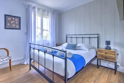 Un ou plusieurs lits dans un hébergement de l'établissement Villa Manava - Climatisée avec terrasse et jardin