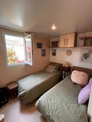 Un ou plusieurs lits dans un hébergement de l'établissement Bungalow bord de Lac Biscarosse