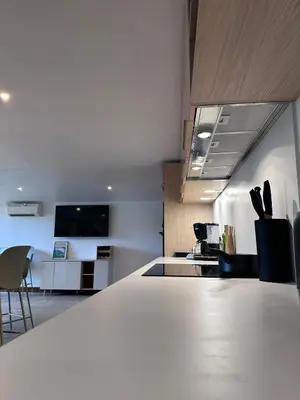 Télévision ou salle de divertissement dans l'établissement Le Tuc Lodge