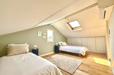 Un ou plusieurs lits dans un hébergement de l'établissement Villa luxueuse avec piscine