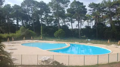 Piscine de l'établissement T3 Nature Ondres plage avec piscine et tennis ou située à proximité