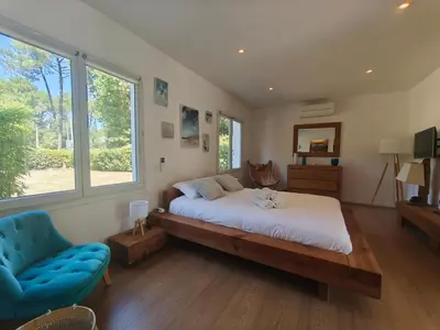 Un ou plusieurs lits dans un hébergement de l'établissement Charming and comfortable villa, golf and ocean nearby
