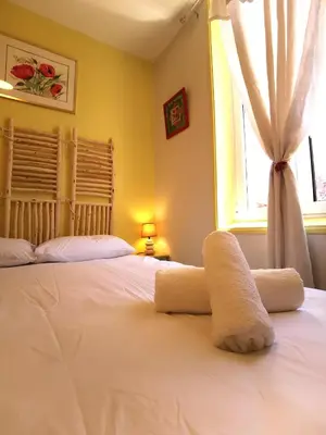 Un ou plusieurs lits dans un hébergement de l'établissement La grange des Bruyères, maison rénovée, 5 chambres
