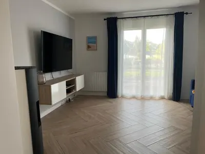 Télévision ou salle de divertissement dans l'établissement Bienvenue