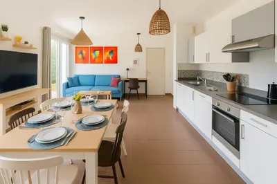 Cuisine ou kitchenette dans l'établissement Appartement cosy avec grand jardin privatif