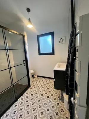 Un ou plusieurs lits dans un hébergement de l'établissement Maison bois 4 Ch Piscine & Spa proche Contis Océan