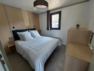 Un ou plusieurs lits dans un hébergement de l'établissement Chalet 5 étoiles empl 74 3CH 2SDB Tv LL Lv Clim