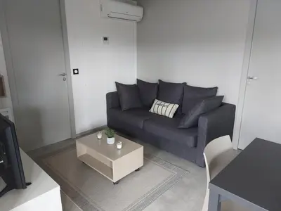 Coin salon dans l'établissement Chalet 5 étoiles empl 74 3CH 2SDB Tv LL Lv Clim