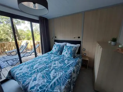 Un ou plusieurs lits dans un hébergement de l'établissement Chalet 5 étoiles empl 74 3CH 2SDB Tv LL Lv Clim