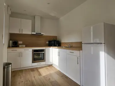 Cuisine ou kitchenette dans l'établissement Appartement entouré de verdure