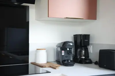 Cuisine ou kitchenette dans l'établissement Le jardin de Sienne - jardin clos
