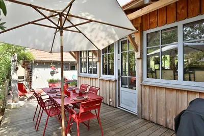 Terrasse ou espace extérieur de l'établissement Villa Honora - Joli maison arcachonnaise à Cazaux