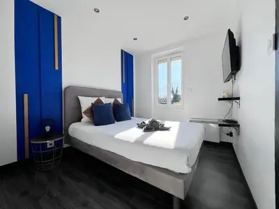 Un ou plusieurs lits dans un hébergement de l'établissement Studio confortable centre-ville Mont de Marsan