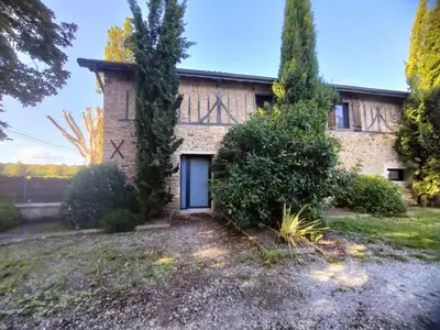 Jardin de l'établissement Appartement dans grange rénovée