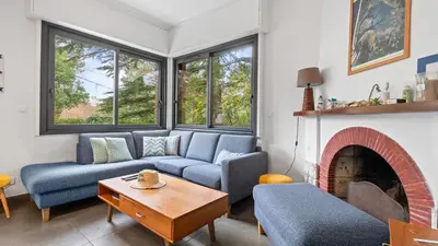 Coin salon dans l'établissement Maison de charme avec jardin et terrasse - Pyla