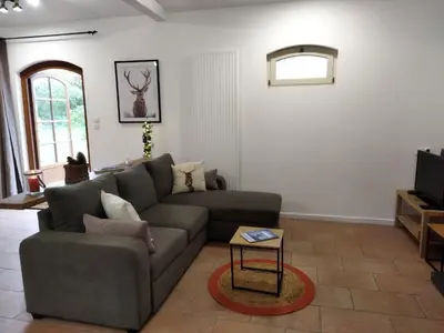 Coin salon dans l'établissement Gîte de charme dans la forêt landaise
