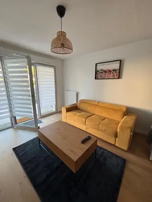 Coin salon dans l'établissement Appartement neuf