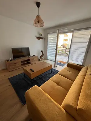 Coin salon dans l'établissement Appartement neuf