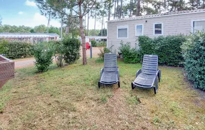 Jardin de l'établissement Cozy Stacaravan In Saint-Julien-En Born
