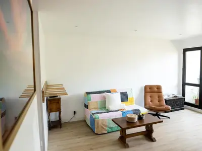 Coin salon dans l'établissement Appartement pour couple- Le Penon proche plage