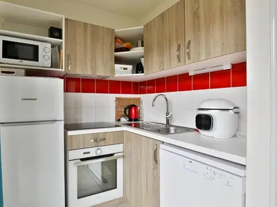 Cuisine ou kitchenette dans l'établissement D des Grands Lacs N19 - 4P8