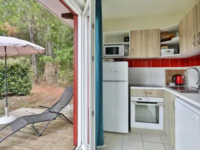 Cuisine ou kitchenette dans l'établissement D des Grands Lacs N19 - 4P8