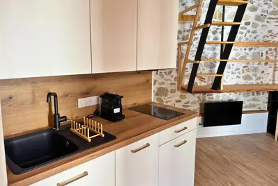 Cuisine ou kitchenette dans l'établissement Cocon - Hyper Centre - Clim - Wifi