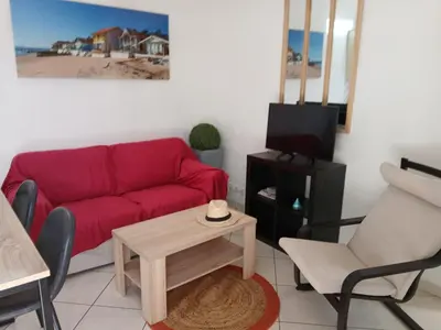 Télévision ou salle de divertissement dans l'établissement Petite maison cœur de ville de La Teste de Buch