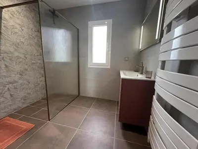 Salle de bains dans l'établissement Quilleret