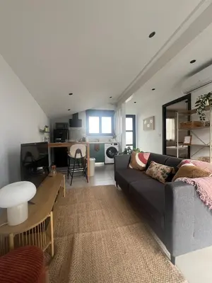 Coin salon dans l'établissement T2 cosy au calme , proche Dax