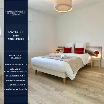Un ou plusieurs lits dans un hébergement de l'établissement L'Atelier des Couleurs - T2 Neuf - plain-pied